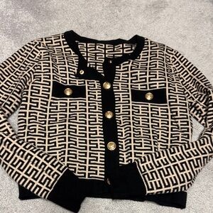 Chic Black and Cream Patterned Cardigan